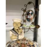 A BRASS TWO LIGHT GIRANDOLE WITH PORCELAIN DISH TRAY TOGETHER WITH A COMPOSITION BUST OF A SAILOR