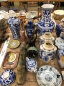 ORIENTAL PORCELAINS AND ENAMELS, A PAIR OF STONE HORSES, BRASS BUDDHA, ETC.