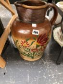 A COLLECTION OF SLOP PAILS, WASHING SET ITEMS, JUGS AND BOWLS TOGETHER WITH A BROWN SALTGLAZE JUG