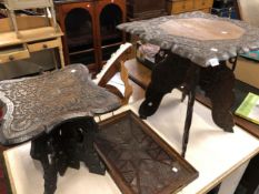 TWO EASTERN CARVED HARDWOOD TABLES AND A SIMILAR TRAY.
