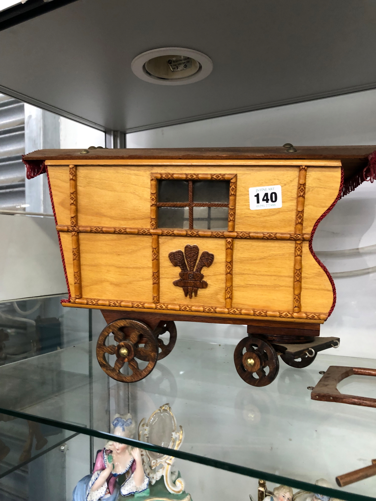 TWO WOODEN MODELS OF CARAVANS, ONE BEARING THE PRINCE OF WALES FEATHERS BELOW A WINDOW