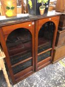 A VICTORIAN MAHOGANY BOOKCASE.