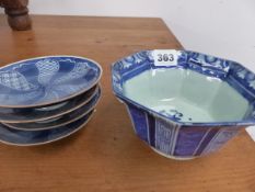 A JAPANESE ARITA BLUE AND WHITE HEXAGONAL BOW TOGETHER WITH FOUR BOWL COVERS