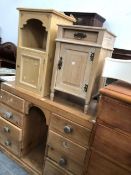 A SMALL VICTORIAN PINE KNEE HOLE SIDE CABINET WITH EIGHT DRAWERS TOGETHER WITH TWO BEDSIDE CABINETS.