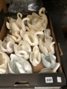 A COLLECTION OF SWANS AND OTHER CERAMIC BIRDS