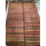 AN ORIENTAL VINTAGE TRIBAL FLAT WEAVED RUG. 213 x 128 cms.