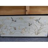 A PAIR OF ORIENTAL SILK NEEDLEWORK PANELS OF BIRDS AND FLOWERS, 31 x 71cms