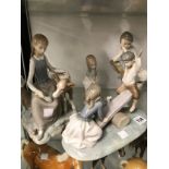 TEN LLADRO AND NAO FIGURES