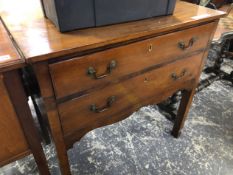 AN EDWARDIAN MAHOGANY TWO DRAWER SIDE TABLE. W 78 X D 46 X H 77cms.