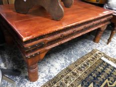 AN EASTERN HARDWOOD CARVED COFFEE TABLE. W 122 X D 76 X H 50cms.