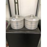 N C JOSEPH LTD, TWO ARCHIBALD KNOX STYLE ALUMINIUM CYLINDRICAL BOXES AND COVERS