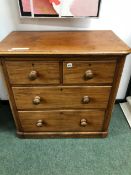 A VICTORIAN MAHOGANY SMALL CHEST OF FOUR DRAWERS. W 90 X D 50 X H 87cms.