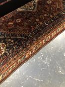 (h) ANTIQUE PERSIAN SHIRAZ RUG, 255 x 179cms.