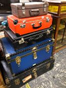 VARIOUS CABIN TRUNKS AND SUITCASES.