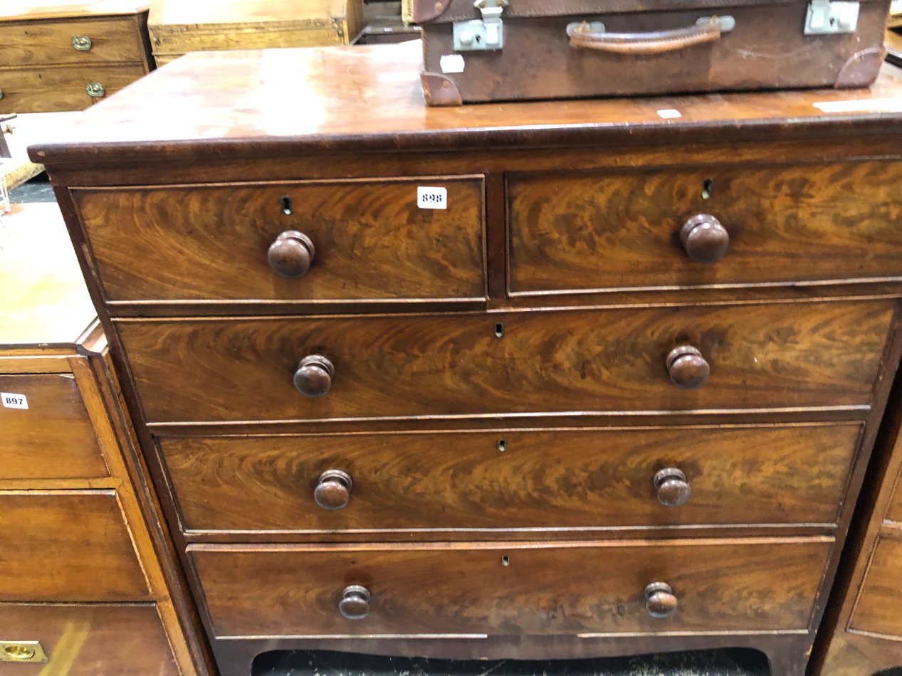 A VICTORIAN FLAME MAHOGANY CHEST OF FIVE DRAWERS. W 100 X D 51 X H 100cms.