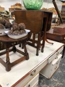 TWO OAK OCCASIONAL TABLES, AND A CHECKERBOARD TOPPED OCCASIONAL TABLE.