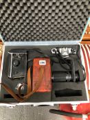 A YASHICA MAT-124 G CAMERA AND A BAKELITE CASED REVERE EIGHT MODEL 55 CINE CAMERA A METAL CASED