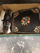A MIDDLE EUROPEAN BLACK GROUND BAG EMBROIDERED WITH FLOWERS AND A PAIR OF SHOES EN SUITE