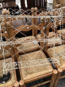 A PAIR OF WIRE WORK WALL SHELVES.