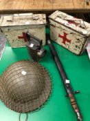 TWO RED CROSS METAL BOXES, A TORCH, A WWII HELMET AND A BAYONET