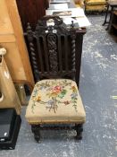 A CARVED OAK HALL CHAIR.