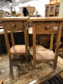 A PAIR OF SMALL BEDSIDE TABLES.