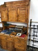 AN ANTIQUE PINE KITCHEN DRESSER WITH RAISED CABINETS OVER. W 123 X D 57 X H 212cms.