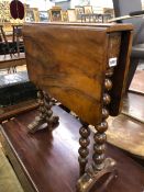 A VICTORIAN WALNUT SUTHERLAND TABLE.