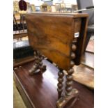 A VICTORIAN WALNUT SUTHERLAND TABLE.