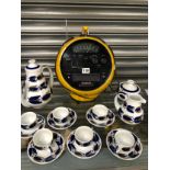 A PRINZSOUND SPHERICAL YELLOW PLASTIC RADIO TOGETHER WITH A SARGADOLOS SIX PIECE COFFEE SET