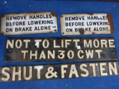 TWO ENAMEL RAILWAY SIGNS INSCRIBED REMOVE HANDLES BEFORE LOWERING ON BRAKE ALONE TOGETHER WITH TWO