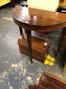 A DEMI LUNE SIDE TABLE AND A SINGER SEWING MACHINE IN CASE.