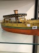 A TIN PLATE MODEL OF A STEAM BOAT