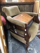 A LATE VICTORIAN TUB ARMCHAIR.