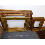 A GROUP OF ANTIQUE AND LATER DECORATIVE GILT PICTURE FRAMES SIZES VARY.