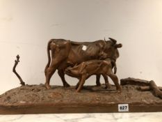 A PLASTER SCULPTURE OF COW AND CALF ON PLINTH BASE.