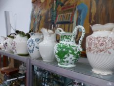ELEVEN POTTERY JUGS FROM WASHING SETS