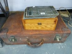 LEADED GLASS PANELS, A WOODEN BOX, LEATHER SUITCASE AND A CAMP BED