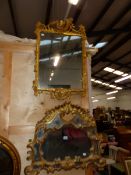 AN ANTIQUE CARVED GILT WOOD GEORGIAN STYLE MIRROR TOGETHER WITH A LATER CONTINENTAL MIRROR (2)