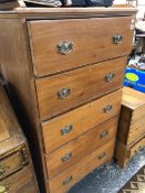 AN EDWARDIAN TALL CHEST OF FIVE DRAWERS.