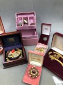 A COLLECTION OF MODERN AND VINTAGE COSTUME JEWELLERY AND CASES.
