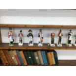 SEVEN VARIOUS MILITARY FIGURINES.