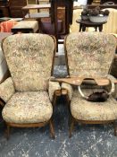 A PAIR OF ERCOL ARM CHAIRS.