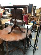 A 19th C. OAK TRIPOD TABLE AND A GATE LEG TABLE.