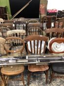 A QUANTITY OF VARIOUS CHAIRS TO INCLUDE SEVEN ANTIQUE LATH BACK KITCHEN CHAIRS, AND OTHERS.