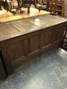 AN 18th C. OAK FOUR PANEL TOPPED AND FRONT COFFER. W 146 X D 58 X H 73cms.