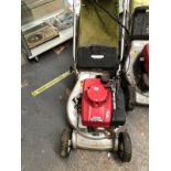 A HONDA HR194 LAWN MOWER.