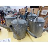 FIVER GALVANISED WATERING CANS.