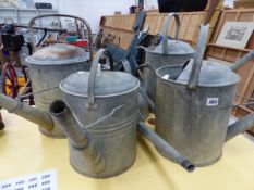 FIVER GALVANISED WATERING CANS.