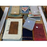 A QUANTITY OF VINTAGE AND VETERAN MOTORING AND VEHICLE CATALOGUES AND MANUELS ECT.